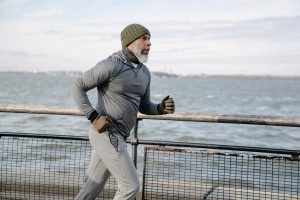 a man running near water