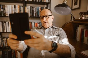 a man holding a device