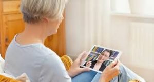 a woman holding a tablet