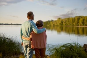 Elderly people enjoying rest on nature