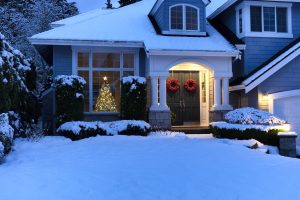 Outside of residential home decorated for Christmas and New Year