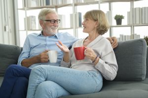 two older adults having a conversation