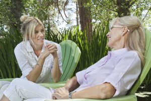 Mature woman and mother having a quality time at park