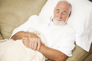 Man Sleeps on Couch